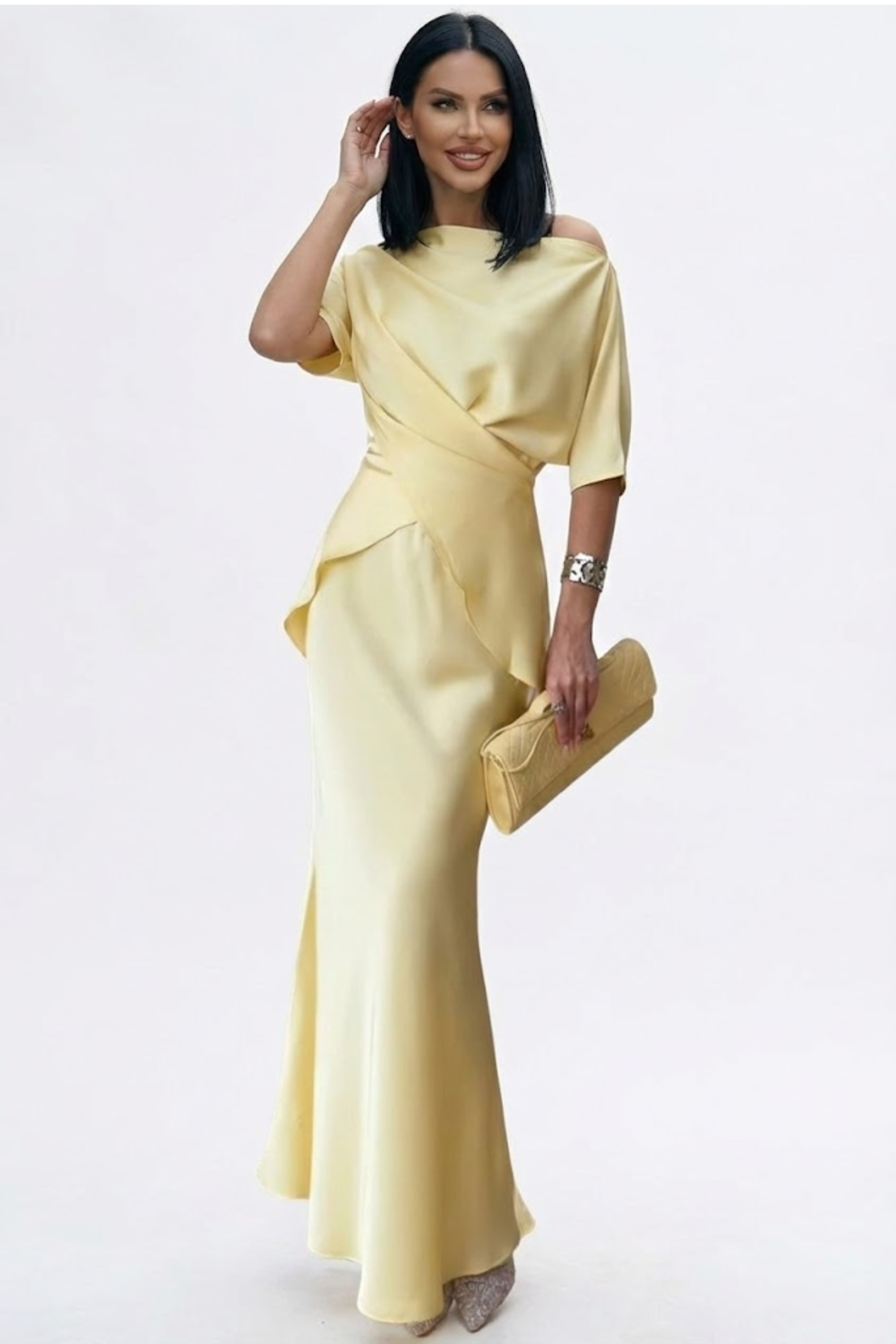 Lucia Milano Conjunto con top de tirantes cruzados y falda fluida