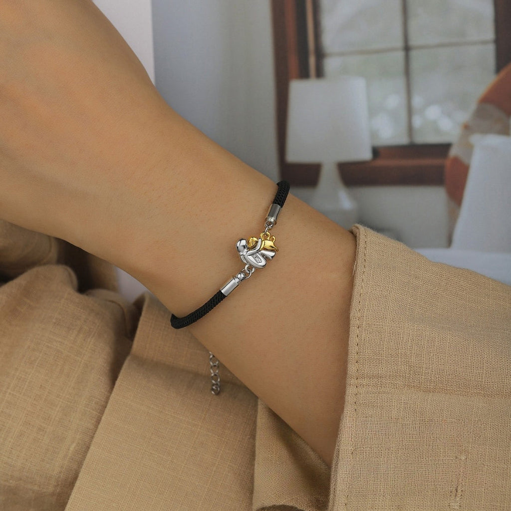 Lucia Milano | Pulsera con cordón e icono de perro.