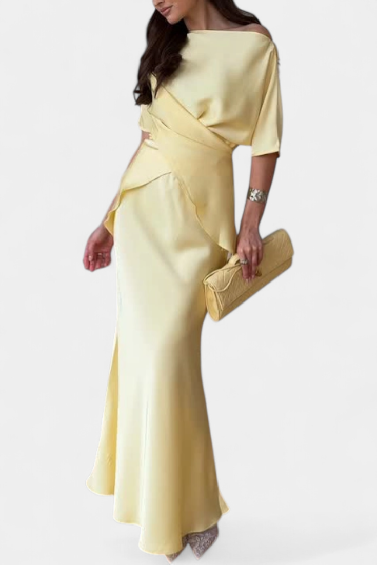 Lucia Milano Conjunto con top de tirantes cruzados y falda fluida