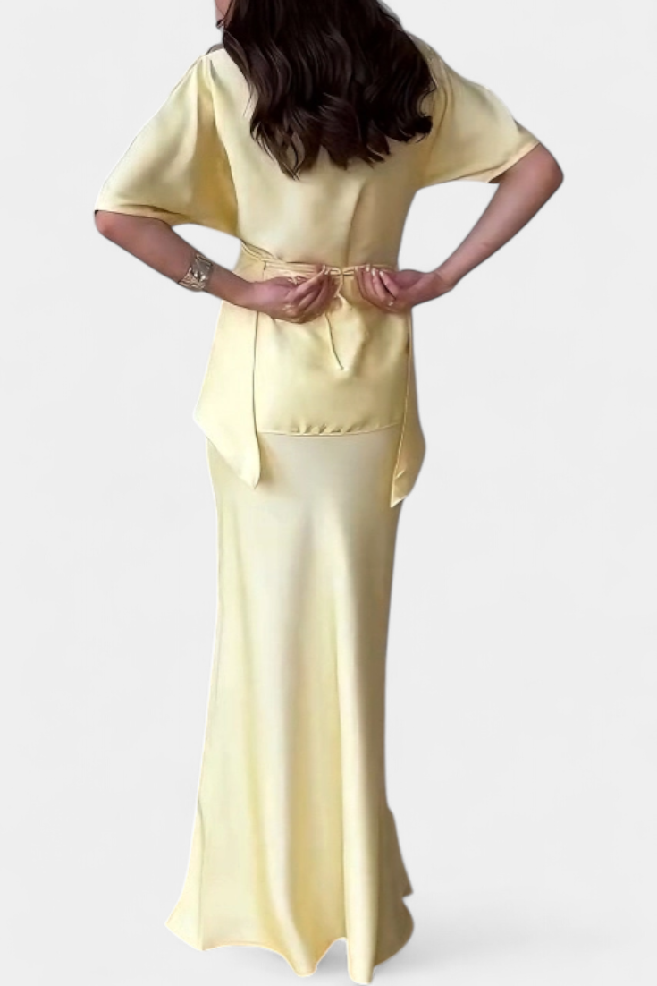 Lucia Milano Conjunto con top de tirantes cruzados y falda fluida