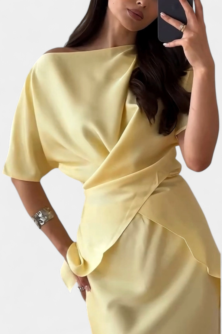 Lucia Milano Conjunto con top de tirantes cruzados y falda fluida