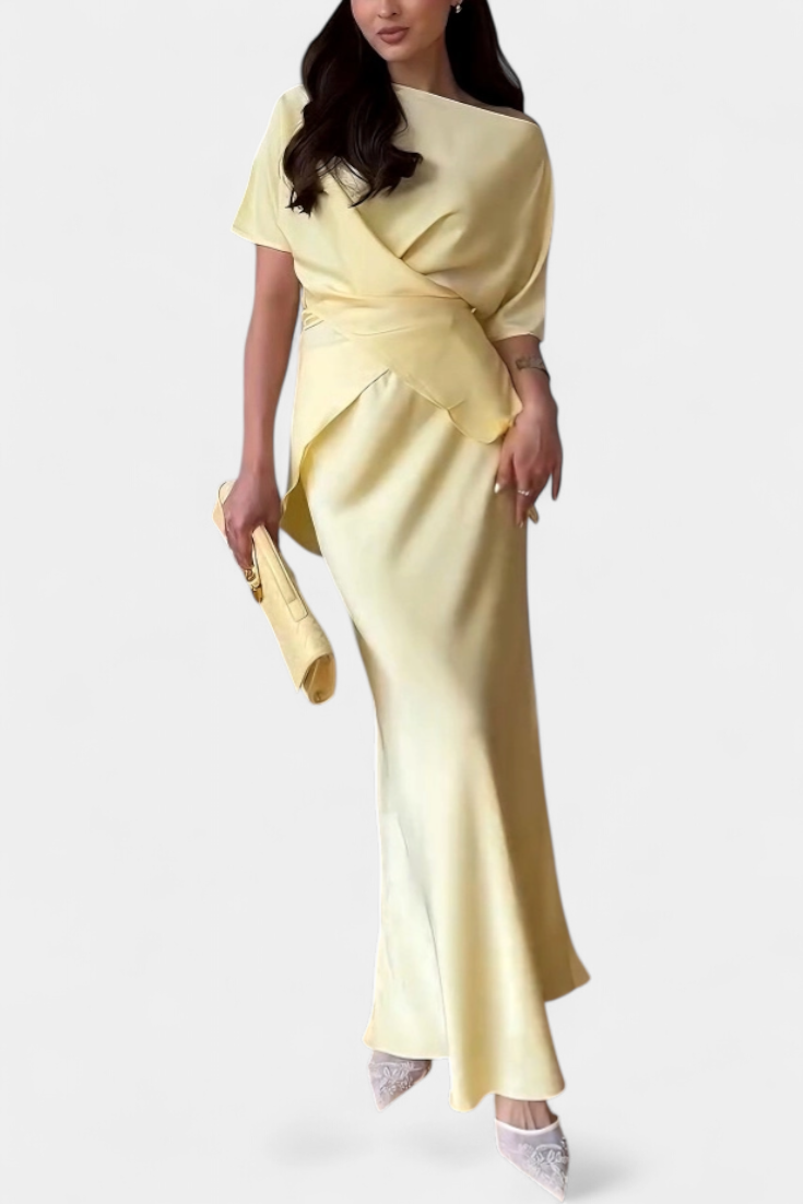 Lucia Milano Conjunto con top de tirantes cruzados y falda fluida