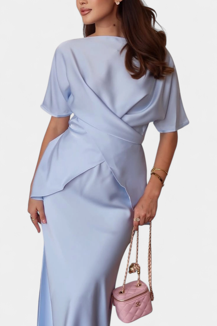 Lucia Milano Conjunto con top de tirantes cruzados y falda fluida