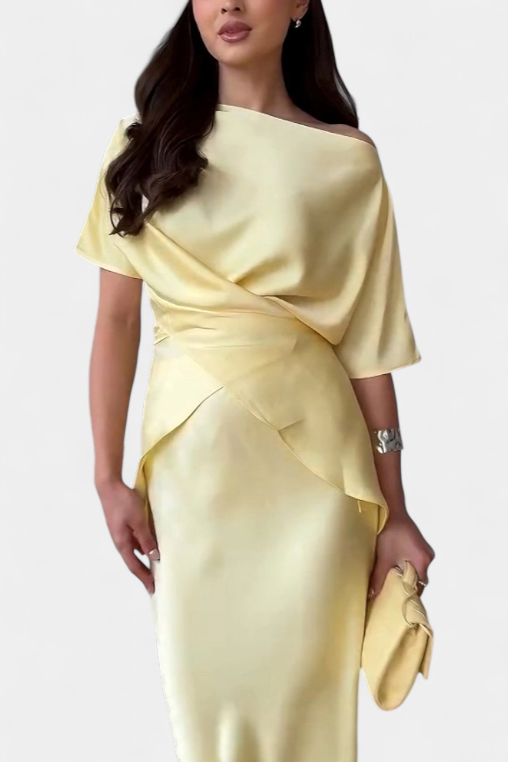 Lucia Milano Conjunto con top de tirantes cruzados y falda fluida